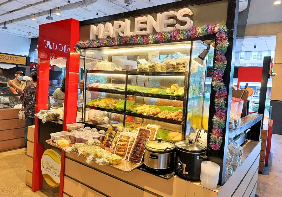 Pasalubong stalls inside Ayala Malls Capitol Central Fiesta Market. A convenient option for last-minute gifts, but expect higher prices than standalone shops.