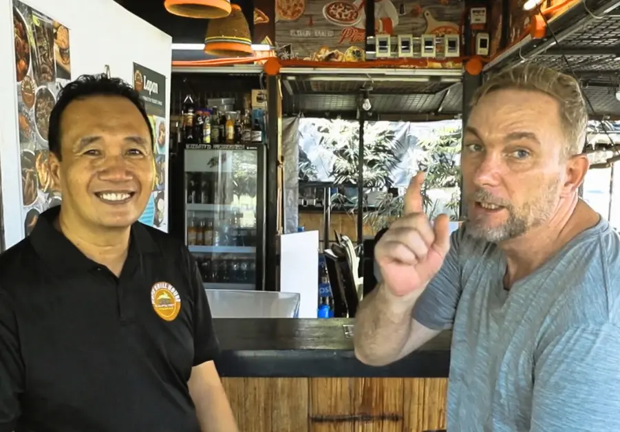 Geoff and Nonoy Doren inside Hops Grill House in Bacolod, the Philippines’ only rabbit-only restaurant.