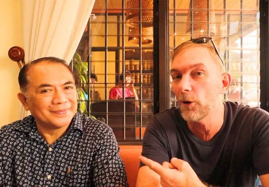 Geoff seated with Amanti of Little Quiapo during his visit