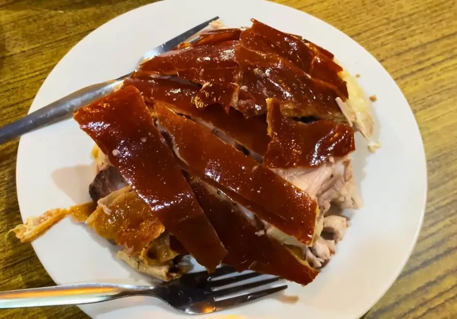 Where to Eat in Quezon City: 11 Must-Try Locations Carinderia-style lechon with classic side dishes at Mila’s Lechon in La Loma.