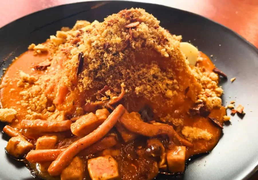 Little Quiapo’s pancit palabok topped with chicharron and thick shrimp sauce