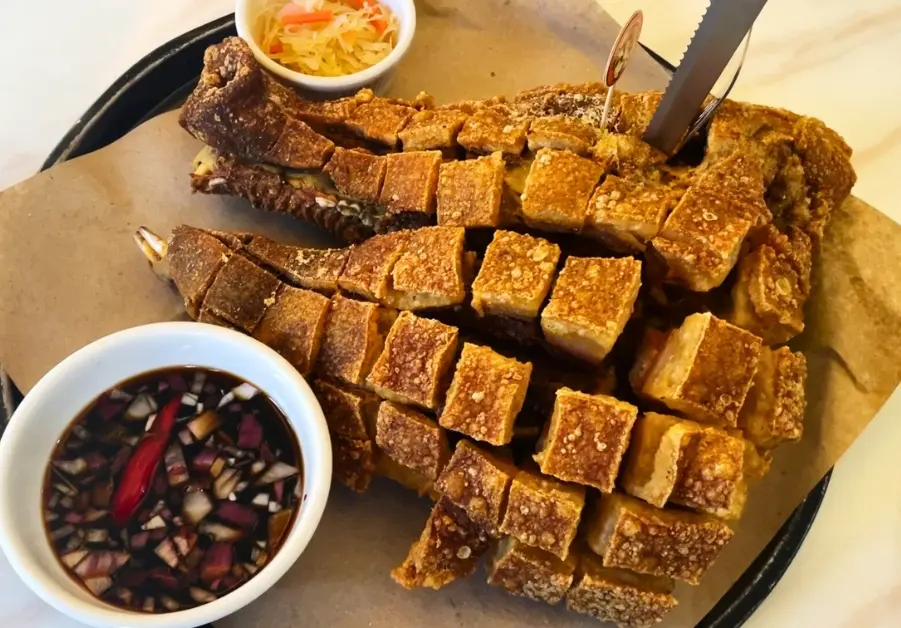 Where to Eat in Quezon City: 11 Must-Try Locations Deep-fried kapalmuks with crispy skin at Pepeton’s Grill and Catering in Quezon City.