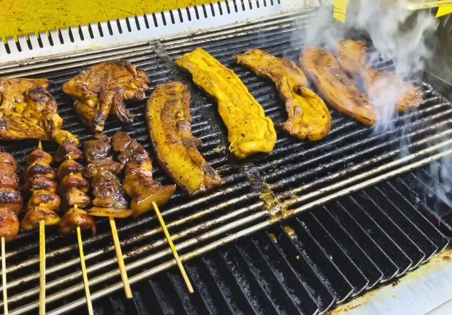 Cheap Eats in Quezon City: Affordable Restaurants and Meals Chicken inasal and liempo grilling over open flames at Nano’s Tsiken Inasal in Quezon City