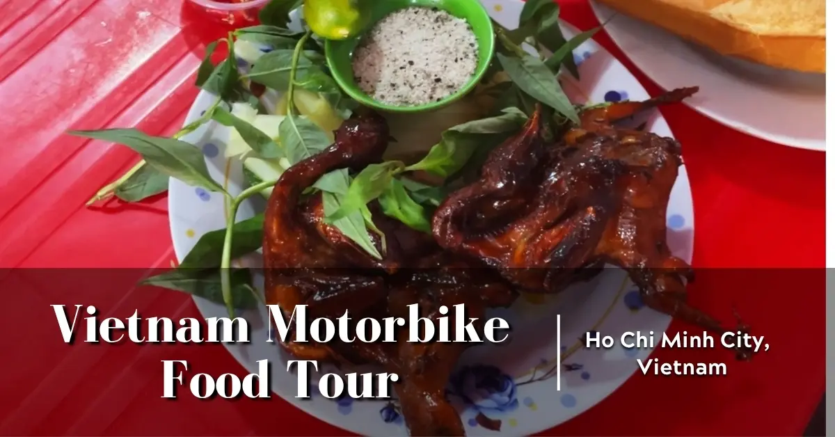 Butter-fried quail with baguette, herbs, and pickled vegetables served in Ho Chi Minh City