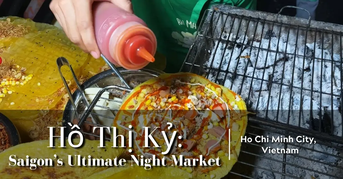 Bánh tráng nướng being grilled and topped with sauce at Hồ Thị Kỷ night market in Ho Chi Minh City, Vietnam.