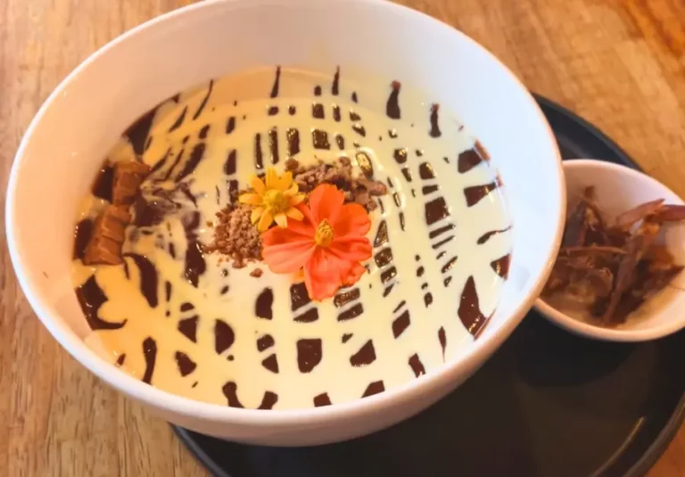 Champorado with milk drizzle and dried fish on the side at Kanto Freestyle Breakfast Kapitolyo
