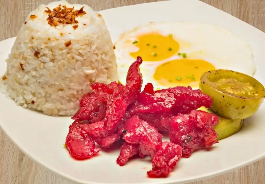 Tocilog plate with garlic rice, fried eggs, and cured pork at Kanto Freestyle menu