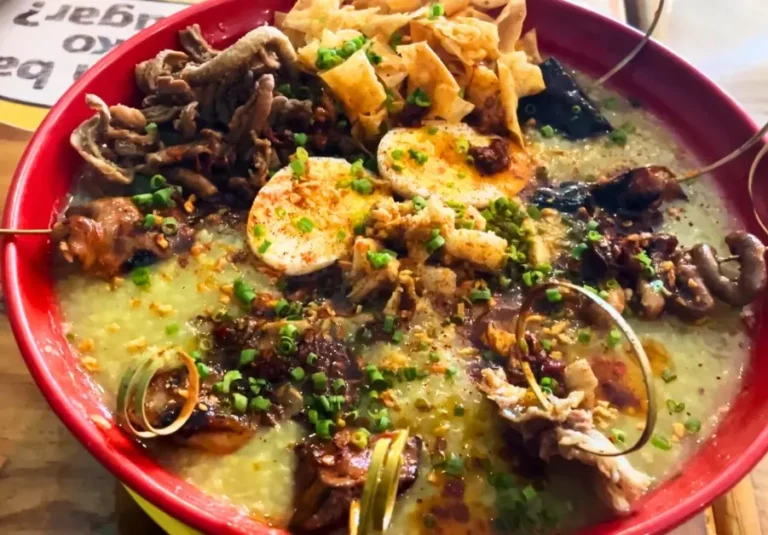 Inferno goto bowl from Goto Believe Kapitolyo with toppings and rich rice porridge