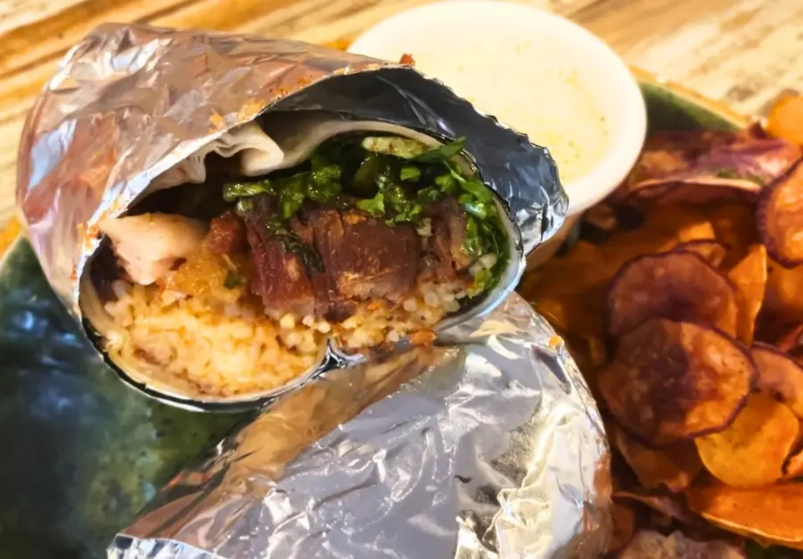 Crispy pork belly burrito with kare-kare rice from Tittos Kapitolyo