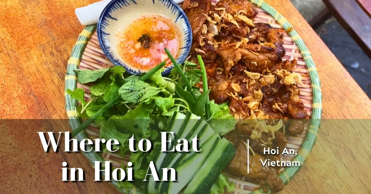 Grilled pork with vegetables and dipping sauce in Hoi An, used as featured image for where to eat in Hoi An.