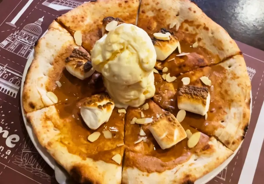roasted speculoos and marshmallow dessert pizza with ice cream at amare la cucina
