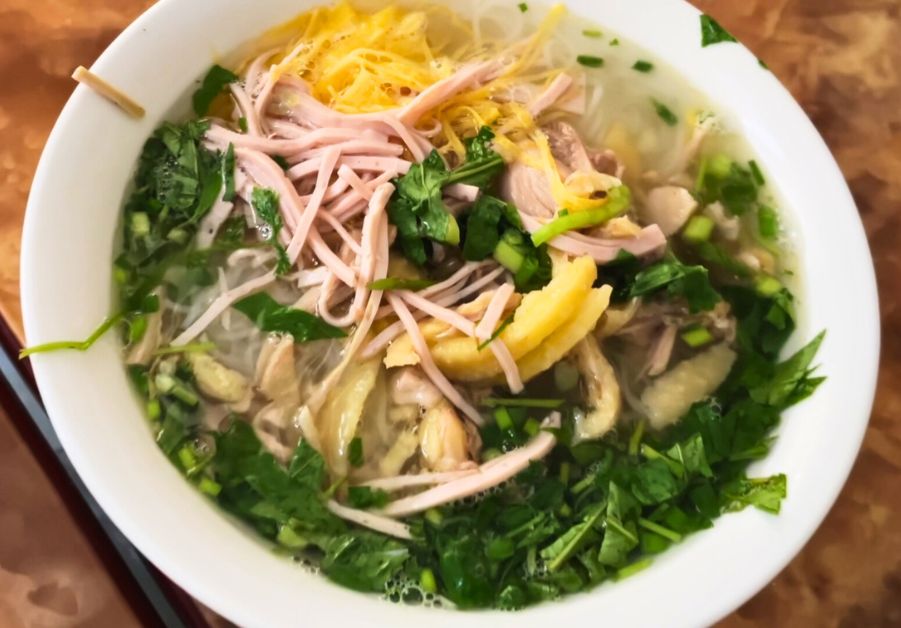 The Old Quarter's Best Restaurants: Both of Them Bowl of Hanoi bun thang with shredded chicken, pork, egg strips, and fresh herbs