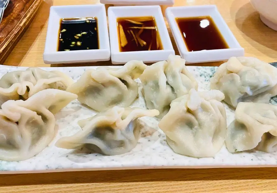 Uniku: Greenfield’s Best Taiwanese Food Steamed kuchay dumplings served at Uniku with three distinct dipping sauces.