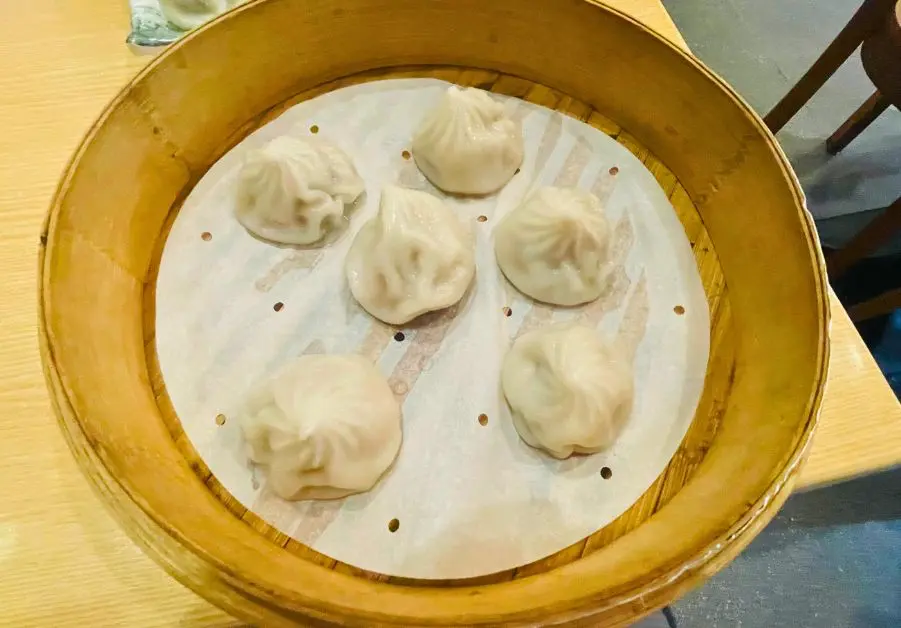 Uniku: Greenfield’s Best Taiwanese Food Uniku's delicate Xiao Long Bao soup dumplings in a traditional bamboo steamer.